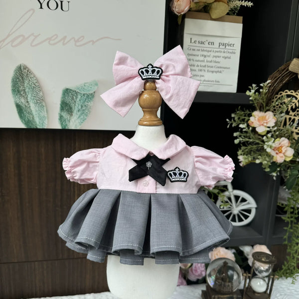 Pink Crown Prep School Dress & Hair Bow for cotton dolls: pink shirt, black bow tie, crown patch, pink hair bow, front view