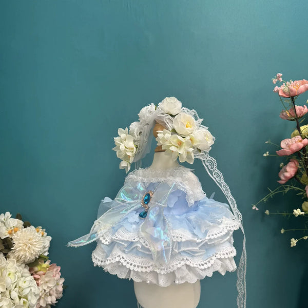 Powder Blue Garland Lace Dress & Flower Crown for cotton dolls: light blue dress, lace tiers, gem brooch, flower crown, front view