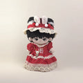 Cotton doll wearing the Berry Bunny outfit: red star-print dress with cream crochet lace, bunny-ear hat and pearl necklace, front view