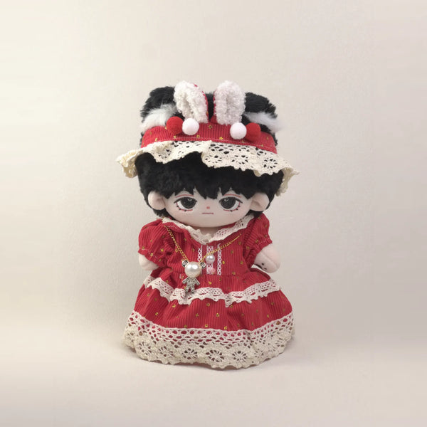 Cotton doll wearing the Berry Bunny outfit: red star-print dress with cream crochet lace, bunny-ear hat and pearl necklace, front view
