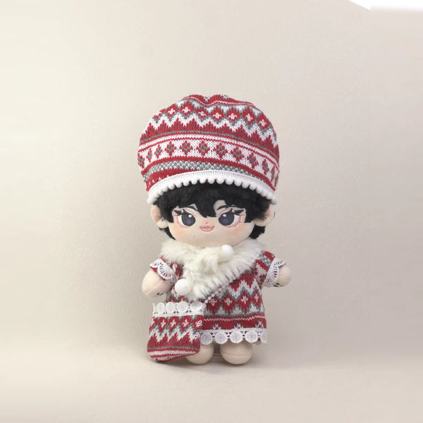 Cotton doll wearing the Fireside Knit outfit: red fair-isle knit dress, slouchy knit hat, white faux-fur scarf and knit bag, front view