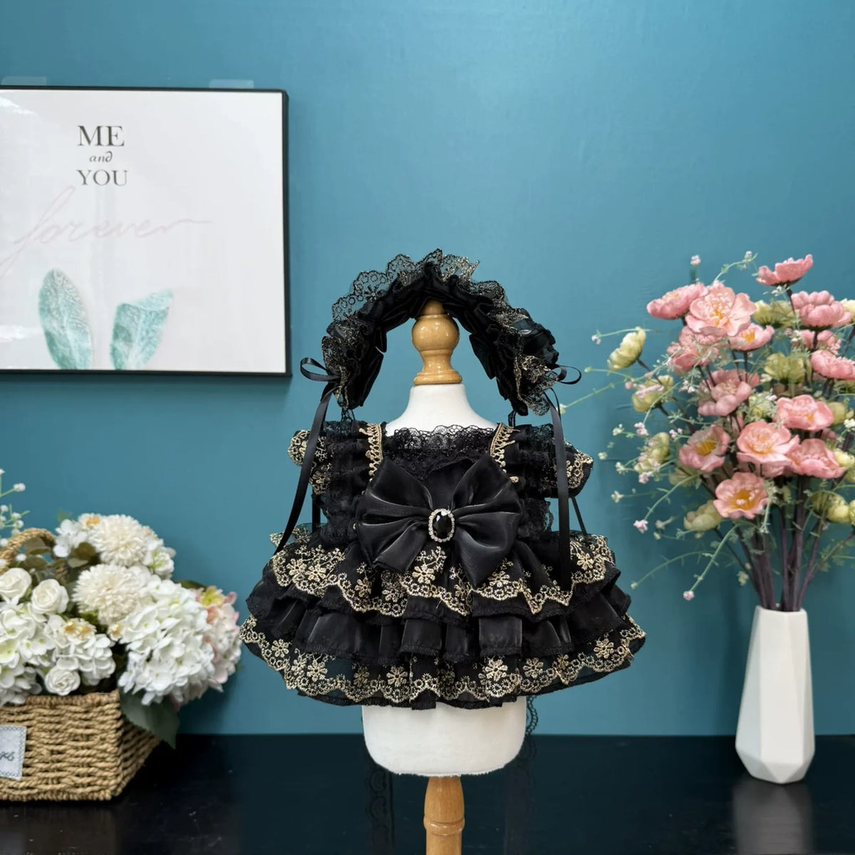 Gilded Noir Dress & Lace Headdress for cotton dolls: black tiers, gold lace trim, black bow with buckle, lace headdress, front view