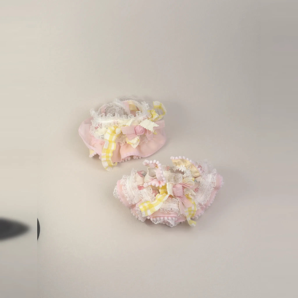 Lemon Sherbet outfit for 20 cm cotton dolls laid flat, second angle: lolita dress, frilled bonnet