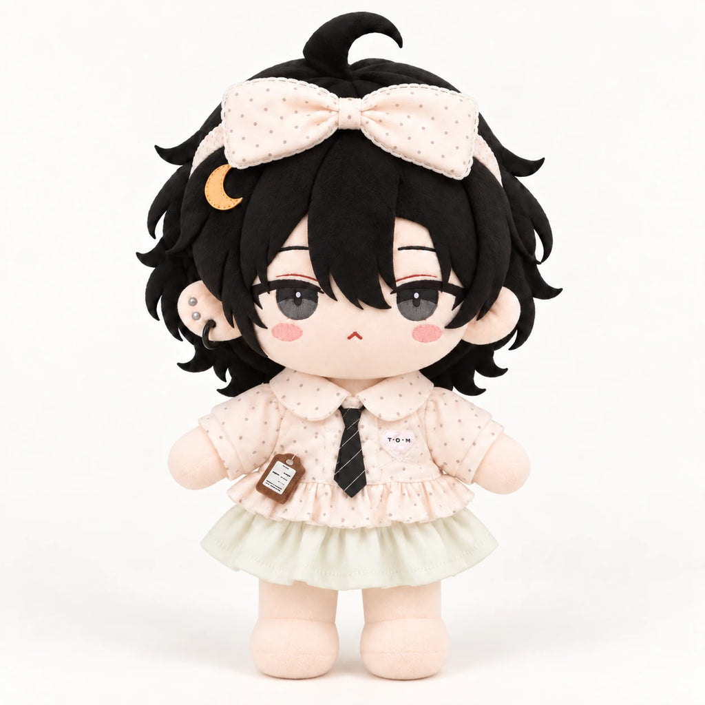 Black-haired cotton doll wearing the Little Whispers outfit: blush polka-dot bow and blouse, striped tie and pale green skirt.