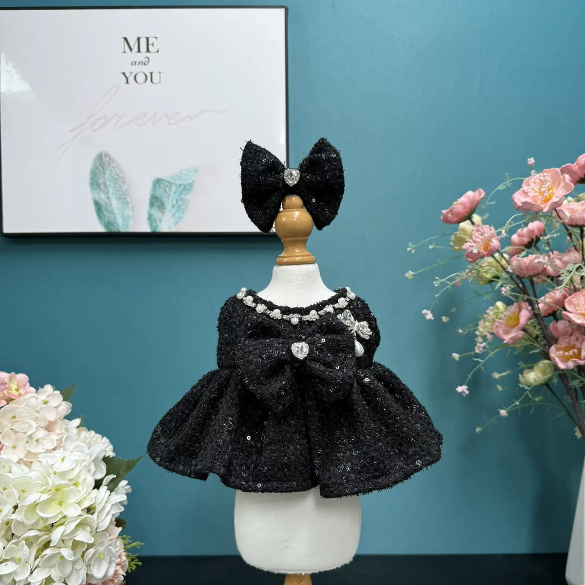 Onyx Sparkle Dress & Hair Bow for cotton dolls: black sparkle dress, pearl neckline, rhinestone heart bow, black bow, front view