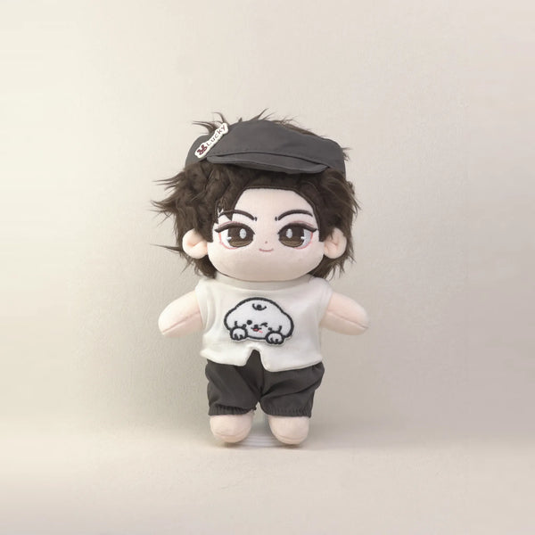 Cotton doll wearing the Puppy Pal outfit: white puppy-patch T-shirt, charcoal shorts and charcoal cap, front view