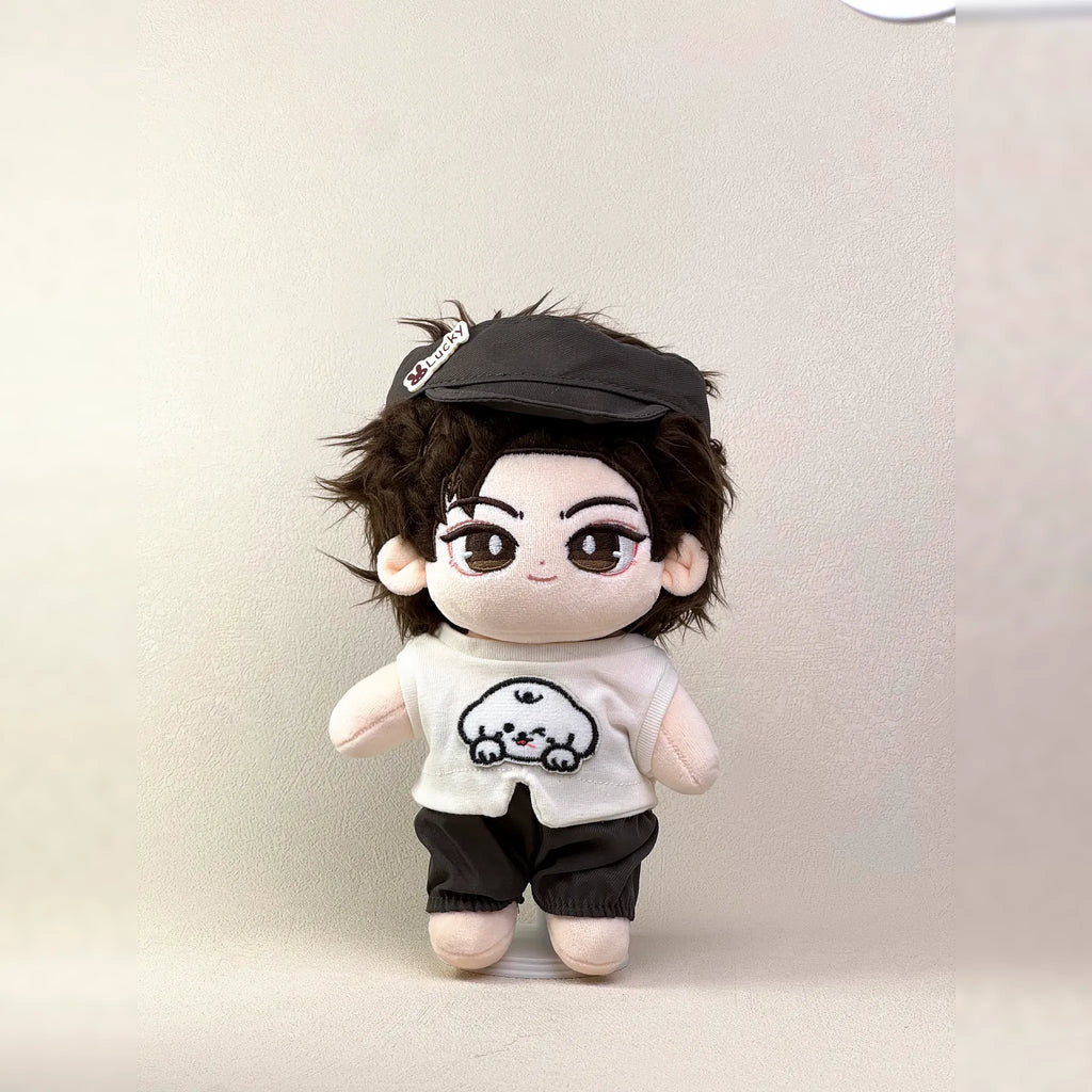 Cotton doll wearing the Puppy Pal outfit: white puppy-patch T-shirt, charcoal shorts and charcoal cap, second front view