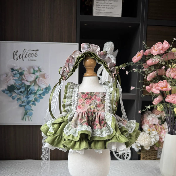 Sage Rose Meadow Rose Pinafore Dress & Bonnet for cotton dolls: rose print pinafore, sage green ruffles, lace trim, rose bonnet, front view
