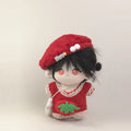Cotton doll wearing the Strawberry Beret outfit: red fleece dress with strawberry patch, red beret and fluffy white bag, front view