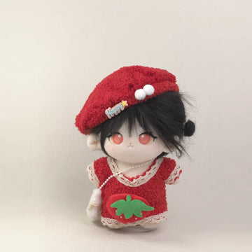 Cotton doll wearing the Strawberry Beret outfit: red fleece dress with strawberry patch, red beret and fluffy white bag, front view