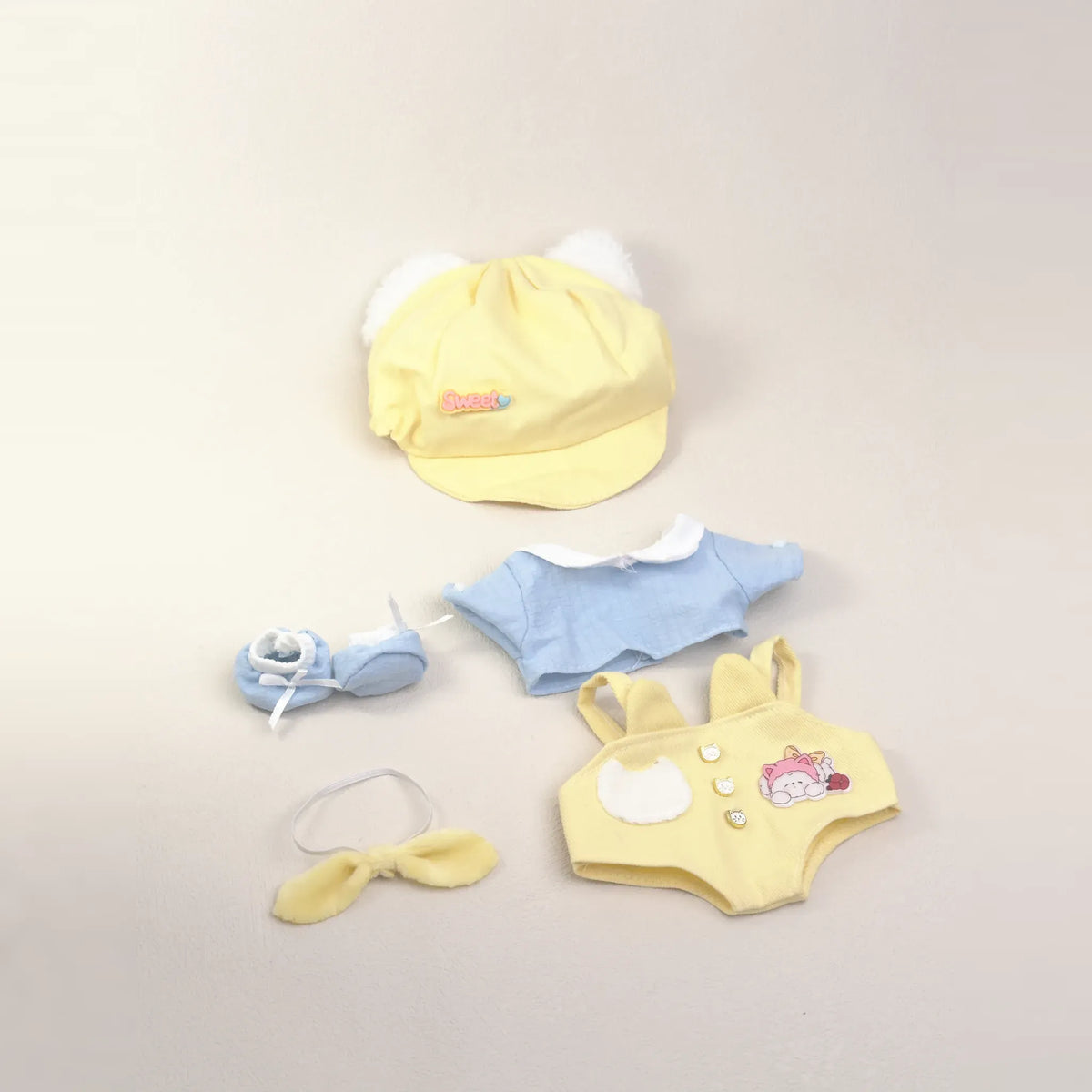 Sunny Kitten outfit for 20 cm cotton dolls laid flat: shirt, overalls, neck bow, cat-ear cap, shoes